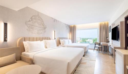 Family Room with Complimentary Shuttle Pickup and Drop to Sai Baba Temple and Guaranteed early check in and late Check out upto 3 hours (Subject to availability)