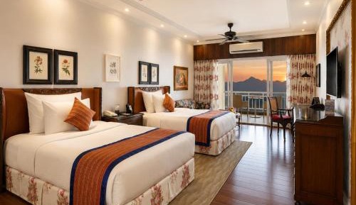 Deluxe Room Sunset View - 10% Discount on Foods & Soft Beverages* | 15% Discounts on Laundry Services* | INR 500 spa credit during your stay on selective Massage services. TnC Apply.* | Free Minibar - 2 cans of soft Beverages (Once on Arrival)