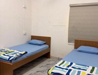 Single Bed in Male Dormitory Room