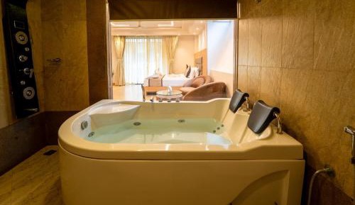 Luxury room with couples jacuzzi