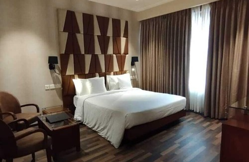 Girgaon Hotel | Adiva Residency Beacon, Grant Road, Mumbai