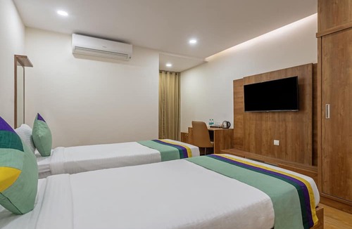 Gachibowli Hotel | Treebo Purva Crest, Gachibowli DLF