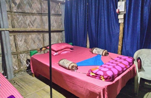 Jorhat Hotel | Jonki Panoi Bamboo Cottages