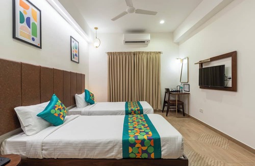 Thousand Lights Hotel | Treebo Flora Embassy