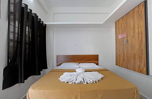 Gudalur Hotel | Hillside Hideaway