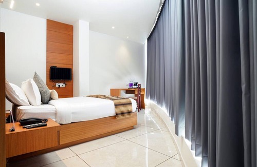 Azhinjilam Hotel | Nexstay Rivermouth International