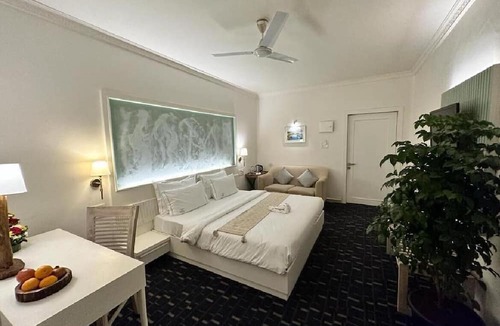 Morjim Hotel | WaveCrest Morjim By Joy Stays