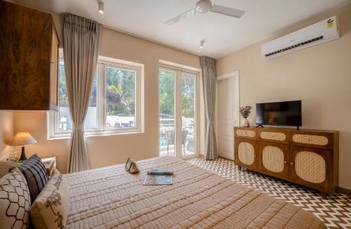 Verem Apartment | Staymaster Solintra - Serviced Apartment with Pool, Gym & Balcony in Nerul