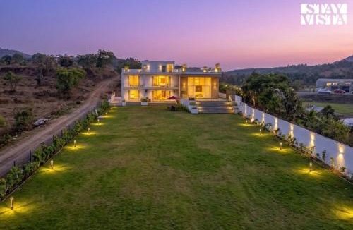 Anjaneri Villa | StayVista at Vayu Farm with BBQ, Bonfire & Lake View