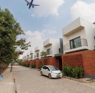 Devanahalli Apartment | Aero Rosewood by Red Olive 3BHK 5min Airport