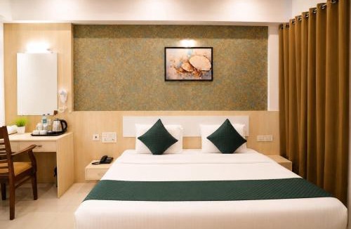Irinjalakuda Hotel | Athirappilly Rainland Resort