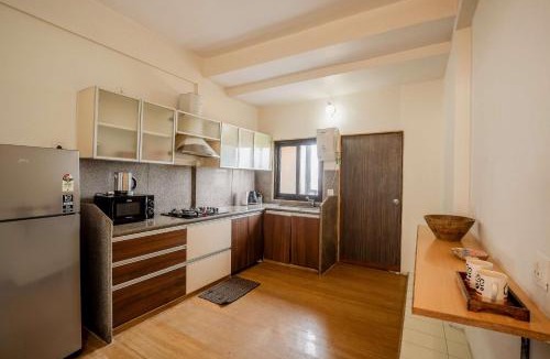 Vainguinim Apartment | Modern 2BHK Apartment in Panjim with Sea View & Pool Access