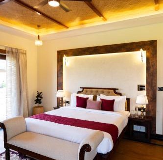 Jamool Khera Apartment | ELIVAAS Signature Tiger Cave Suite with Pvt and Shared Pool On Main Ranthambore Rd