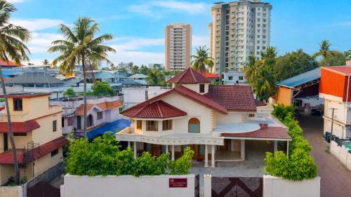 Mamangalam Villa | ELIVAAS Valiyaveetil Mansion 5-BHK Mansion With Private Pool, Home Theatre & Garden Near New Marine Drive