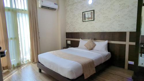 Koramangala Hotel | AVM Comforts Inn Koramangala