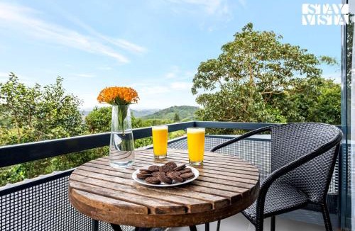 Mananthavady House | StayVista at Griha Sankalpa with Mountain View, BBQ Wayanad