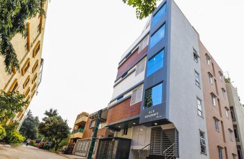 Yelahanka Hotel | Capital O SLN Residency