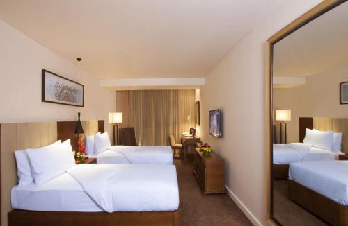 Palm Meadows Hotel | Oakwood Residence Whitefield Bangalore