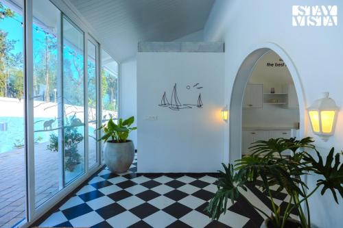 StayVista at Mudra Tattva - Pvt Pool,Lawn,Jacuzzi 2BR Luxury Rooms
