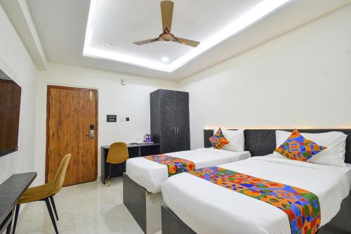 FabHotel Prime Srishoin - Nr TCS Deccan Park Hitech City